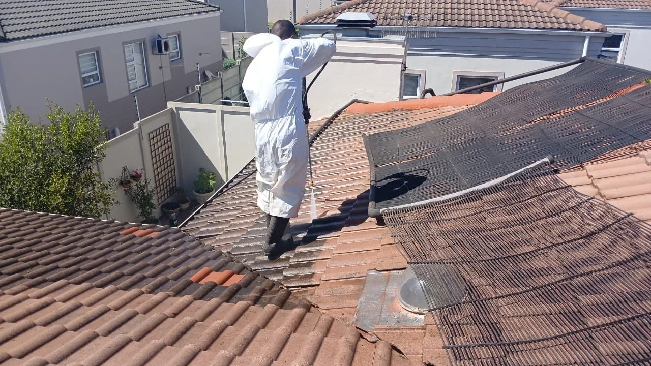 Pressure washing a tiled roof